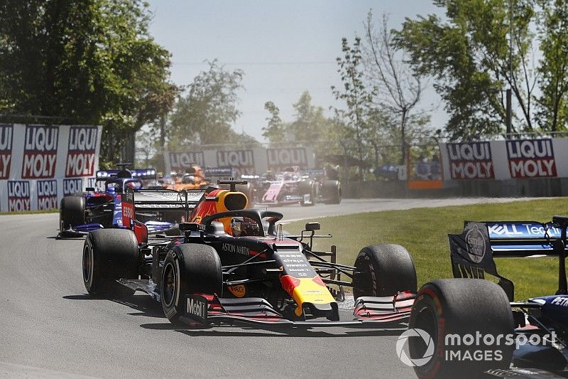 Max Verstappen, Red Bull Racing RB15, leads Daniil Kvyat, Toro Rosso STR14