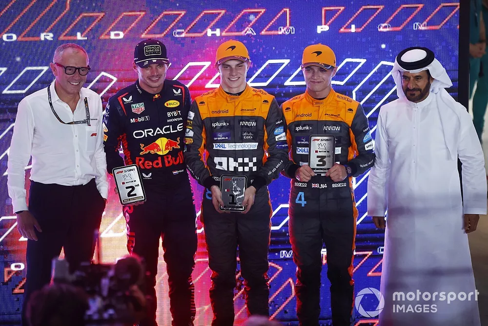 Stefano Domenicali, CEO, Formula 1, Max Verstappen, Red Bull Racing, 2nd position and 2023 drivers world champion, Oscar Piastri, McLaren, 1st position, Lando Norris, McLaren, 3rd position, Mohammed bin Sulayem, President, FIA