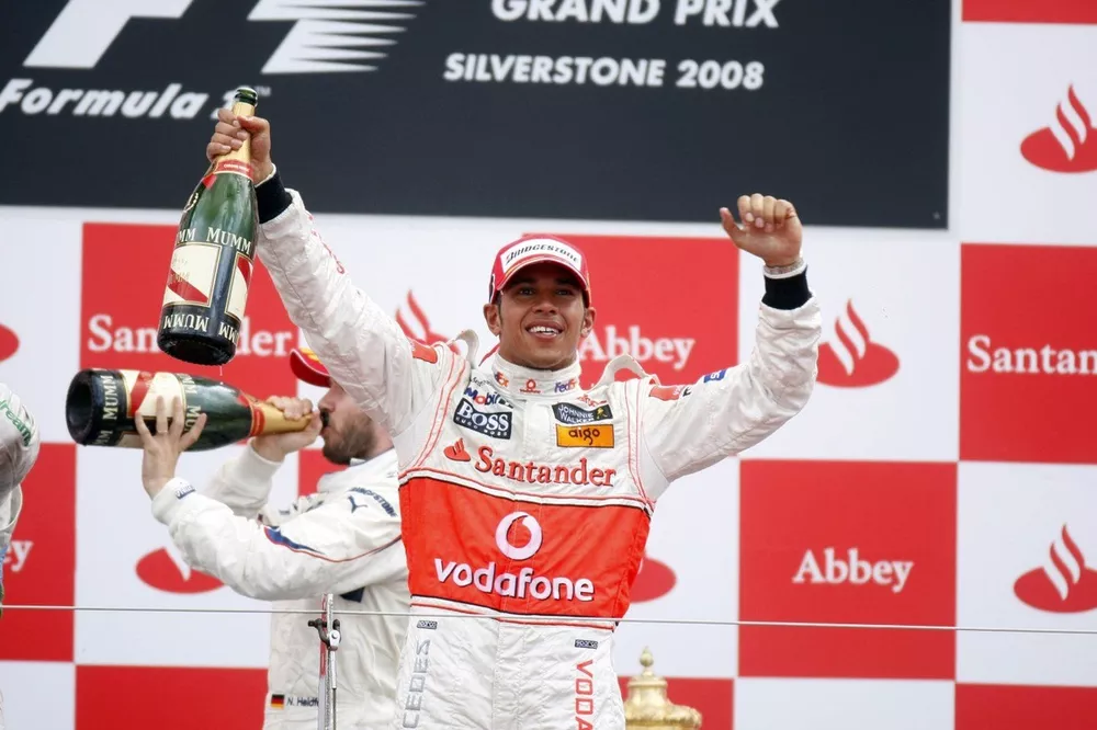 Podium: race winner Lewis Hamilton, McLaren