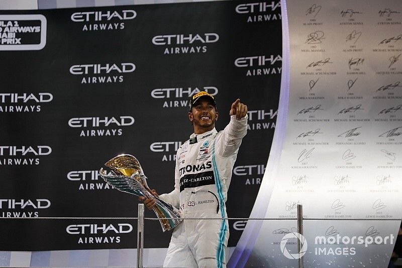 Lewis Hamilton, Mercedes AMG F1, 1st position and world Champion, on the podium