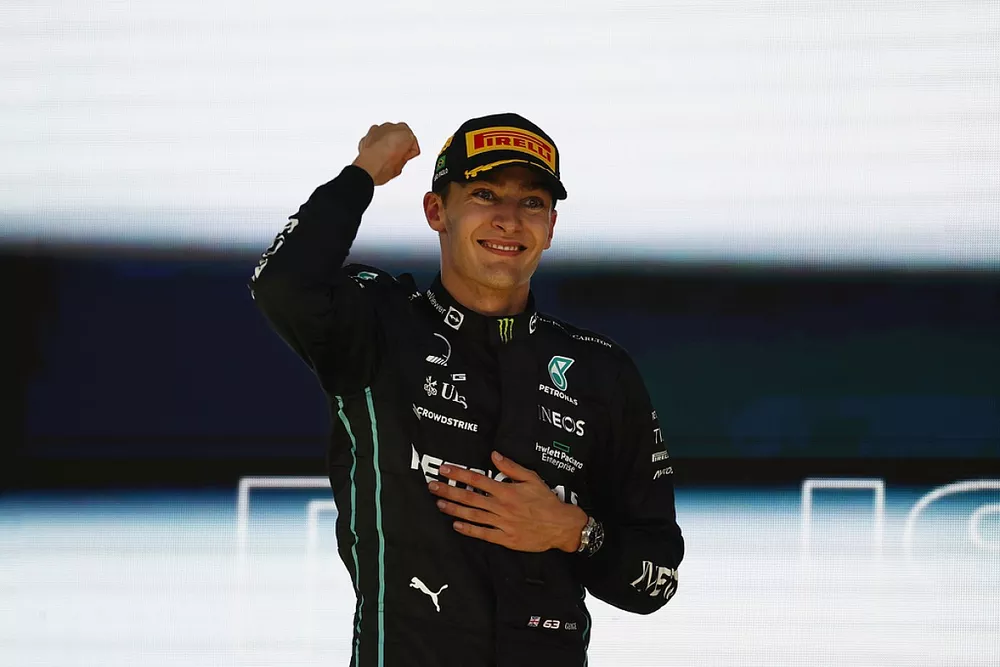 George Russell, Mercedes AMG, 1st position, celebrates on the podium