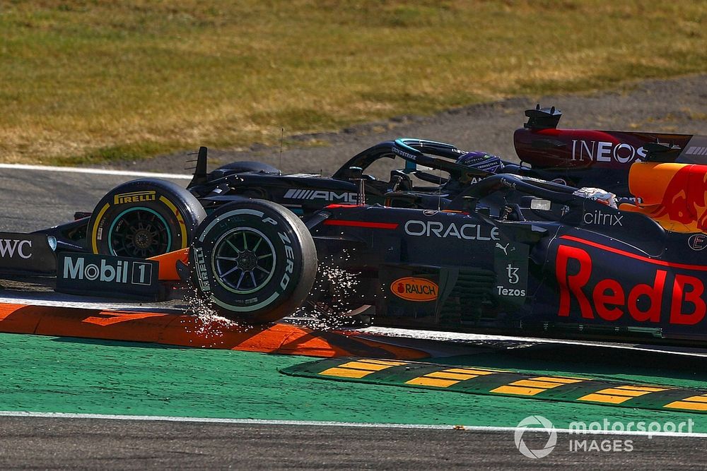 Lewis Hamilton, Mercedes W12, and Max Verstappen, Red Bull Racing RB16B, collide