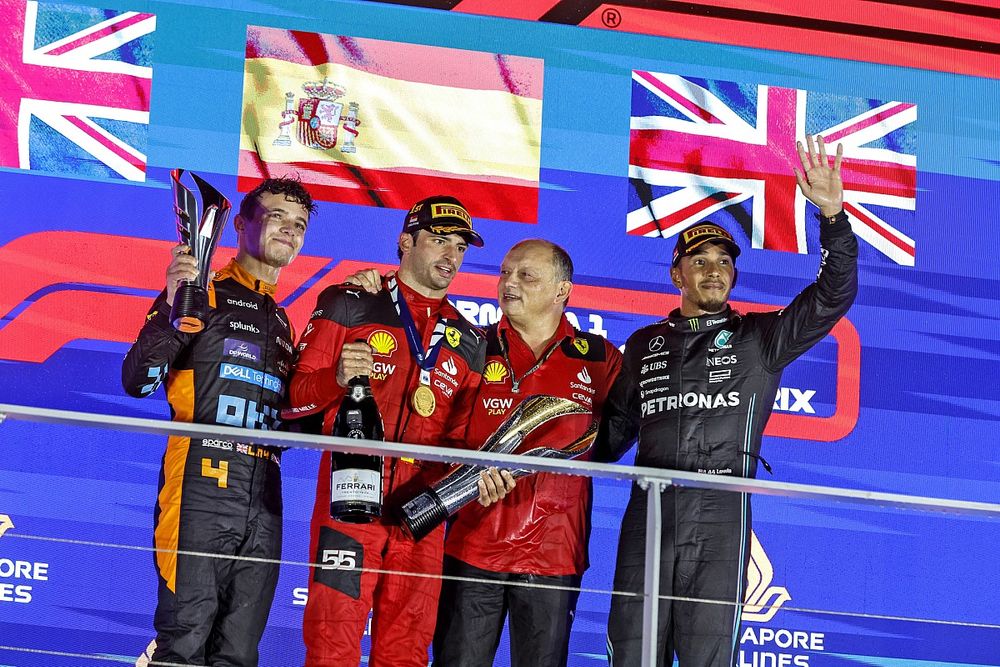 Lando Norris, McLaren, 2nd position, Carlos Sainz, Scuderia Ferrari, 1st position, Frederic Vasseur, Team Principal and General Manager, Scuderia Ferrari, Lewis Hamilton, Mercedes-AMG, 3rd position, on the podium