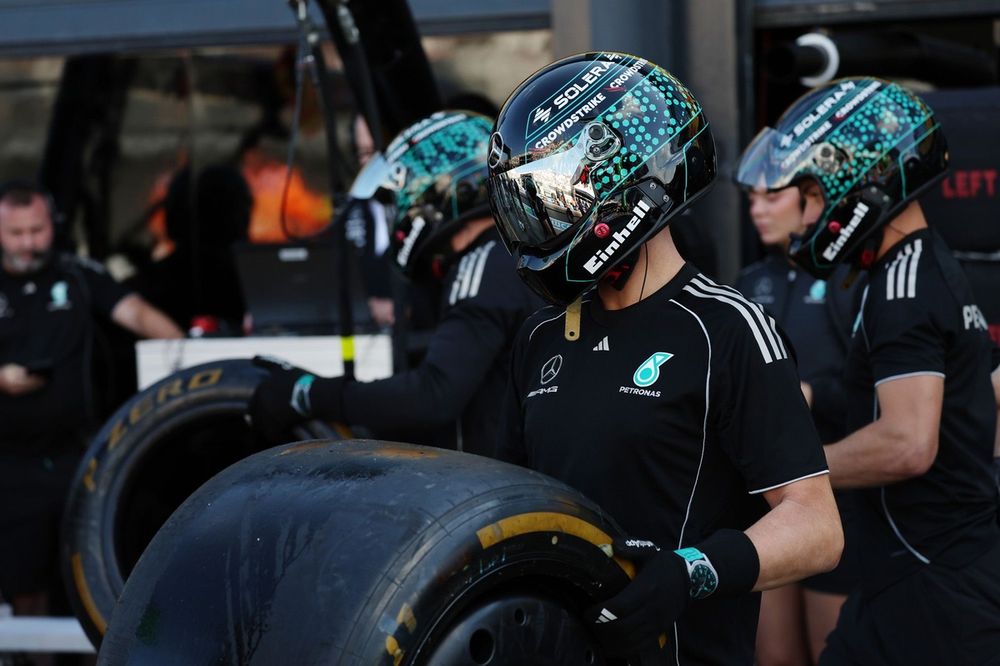 The Mercedes AMG Petronas F1 Team pit crew prepare for a pitstop
