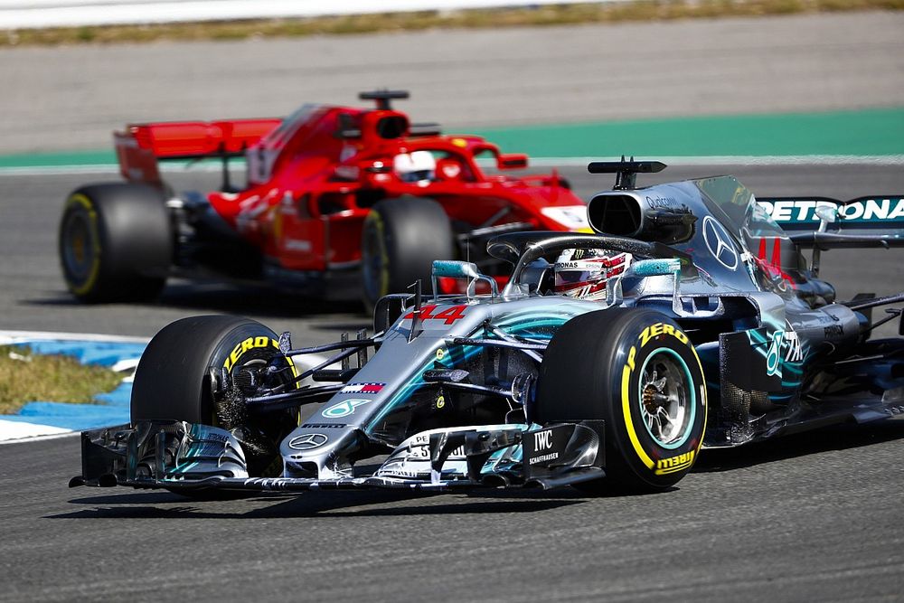Lewis Hamilton, Mercedes AMG F1 W09, leads Sebastian Vettel, Ferrari SF71H