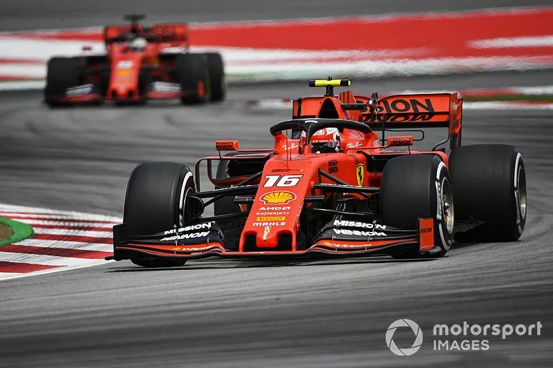 Charles Leclerc, Ferrari SF90, leads Sebastian Vettel, Ferrari SF90