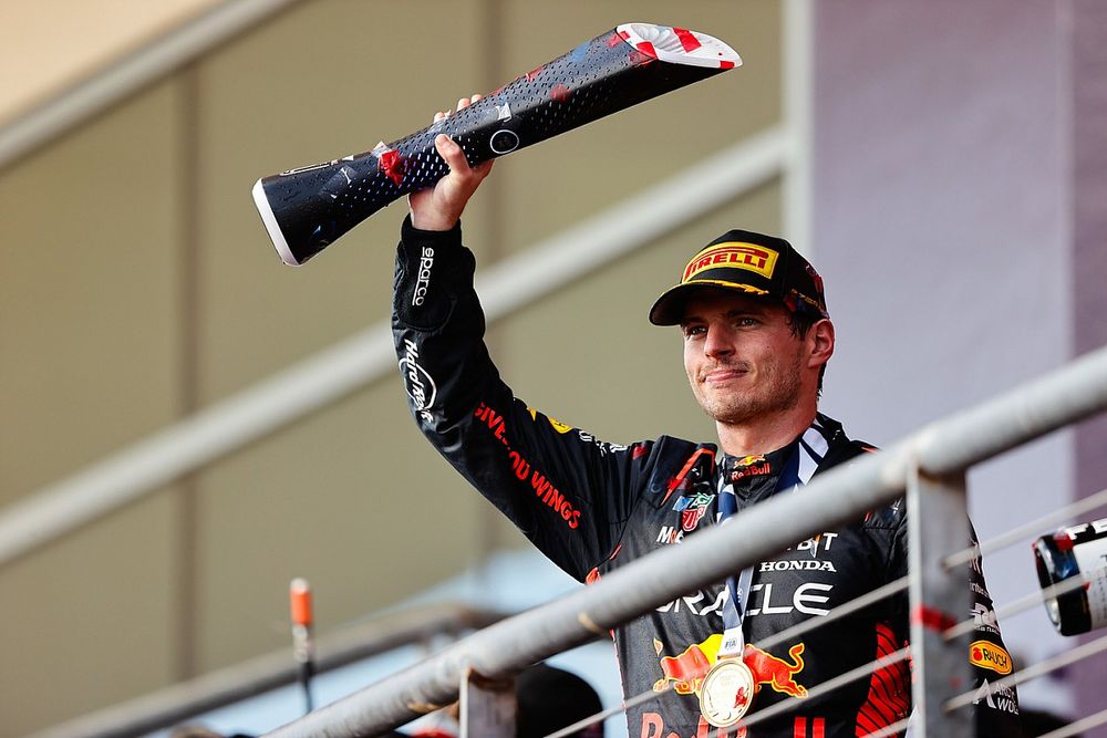 Max Verstappen, Red Bull Racing, 1st position, on the podium with his trophy