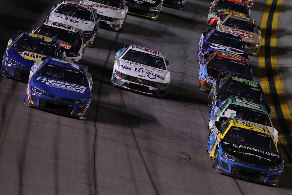 The field races to two laps to go