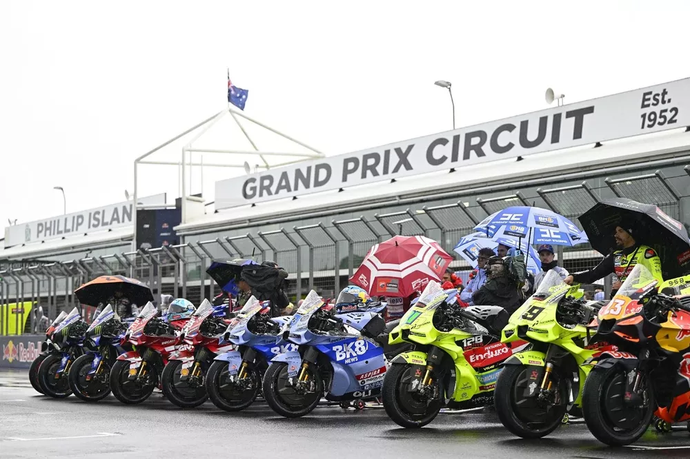 The riders and bikes line up