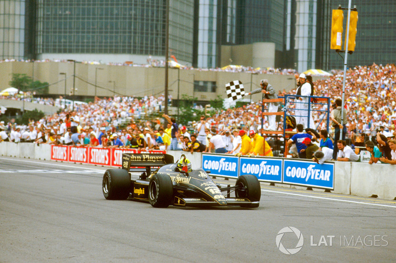 Ayrton Senna, Lotus 98T Renault, crosses the line for victory