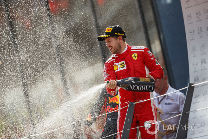 Podio: el tercer lugar Sebastian Vettel, Ferrari