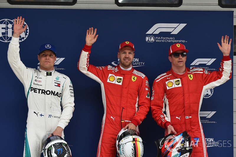 Polesitter Sebastian Vettel, Ferrari, second place Kimi Raikkonen, Ferrari, third place Valtteri Bot