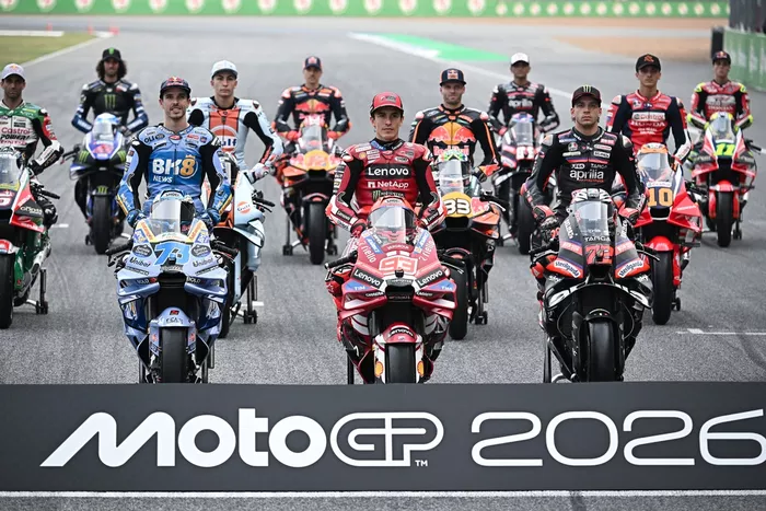 MotoGP riders pose for a group photo