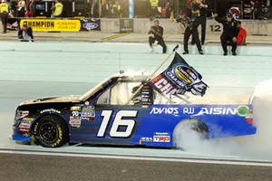 Brett Moffitt, Hattori Racing Enterprises, Toyota Tundra AISIN Group celebrates his win with a burnout 