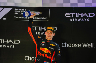 Max Verstappen, Red Bull Racing, 3rd position, lifts his trophy on the podium