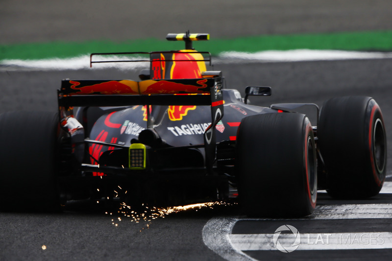 Max Verstappen, Red Bull Racing RB13, throws up some sparks