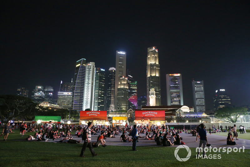 Fans and Singapore skyline