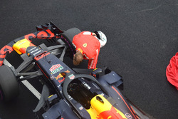 Sebastian Vettel, Ferrari watches the Red Bull Racing RB14