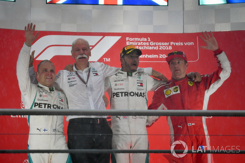 Valtteri Bottas, Mercedes-AMG F1, Dr. Dieter Zetsche, CEO of Daimler AG, Lewis Hamilton, Mercedes-AMG F1 and Kimi Raikkonen, Ferrari celebrate on the podium