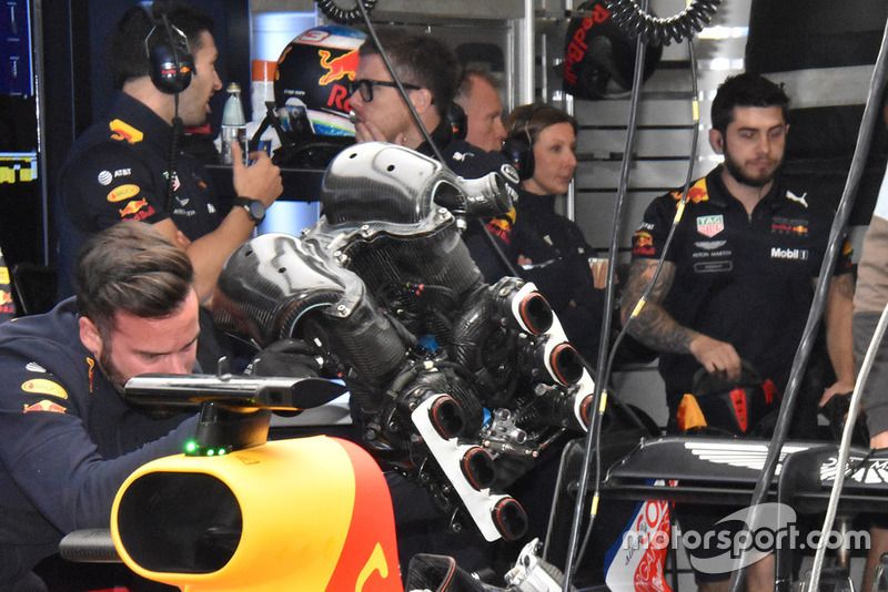 Red Bull Racing team members at work