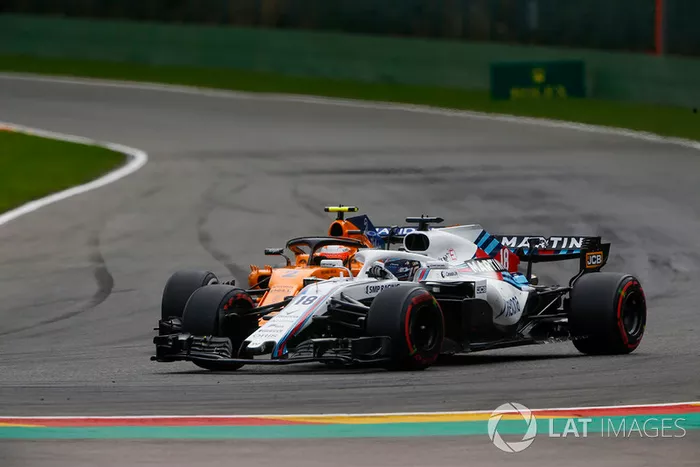 Lance Stroll, Williams FW41, y Stoffel Vandoorne, McLaren MCL33