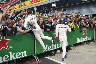 Lewis Hamilton, Mercedes AMG F1, and Valtteri Bottas, Mercedes AMG F1, celebrate in parc ferme