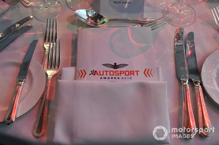 Set place at a table with the Awards programme