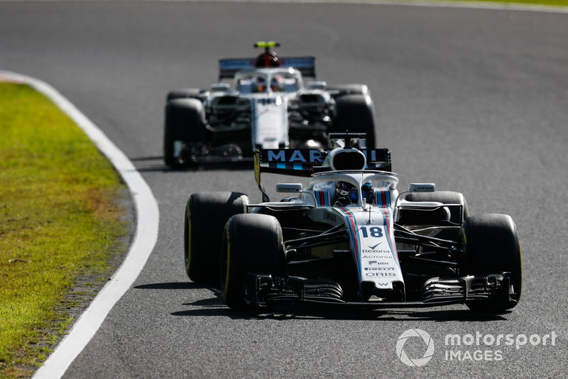 Lance Stroll, Williams FW41, leads Charles Leclerc, Sauber C37
