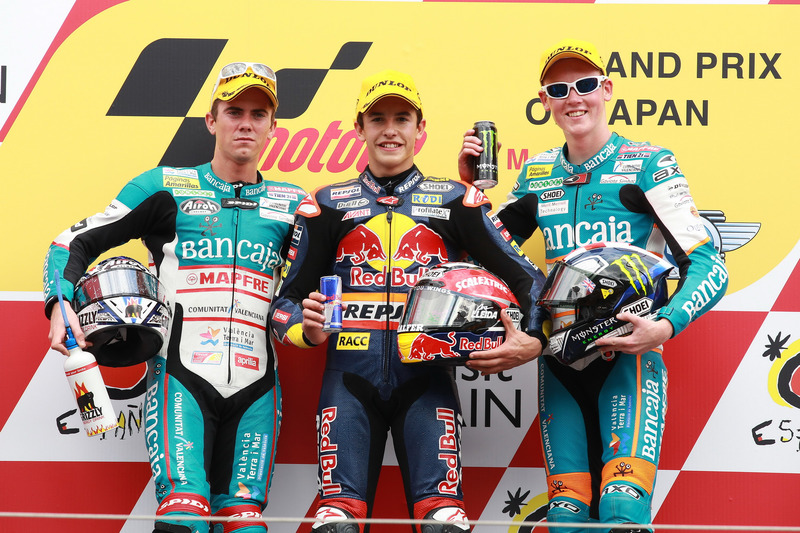 Podium: second place Nicolás Terol, Race winner Marc Marquez, third place Bradley Smith