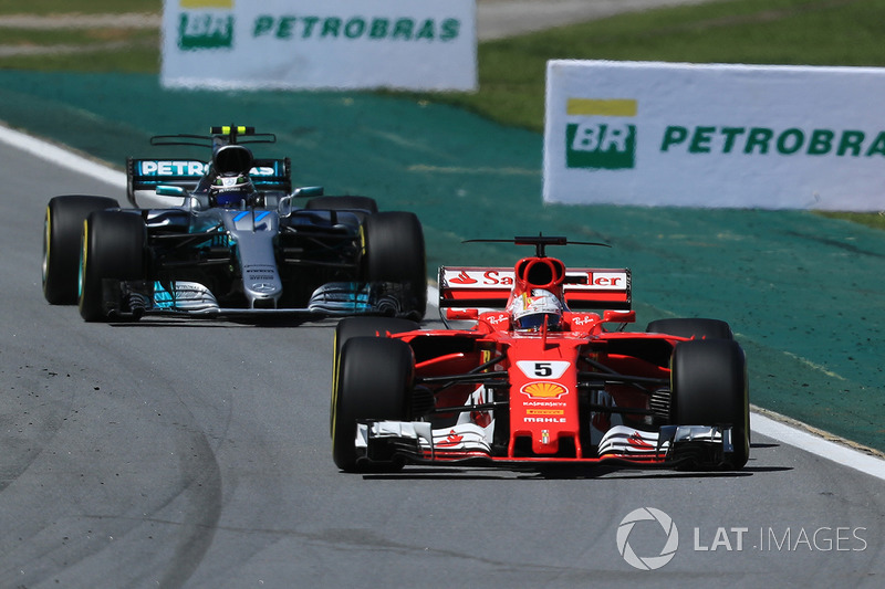 Sebastian Vettel, Ferrari SF70H and Valtteri Bottas, Mercedes-Benz F1 W08