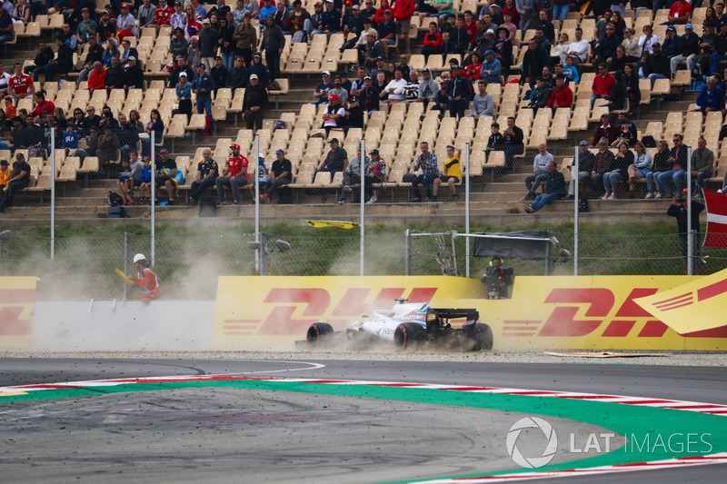 Lance Stroll, Williams FW41, spins into the gravel