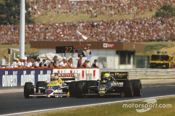 Ayrton Senna (Lotus 98T Renault), Nigel Mansell (Williams FW11 Honda)