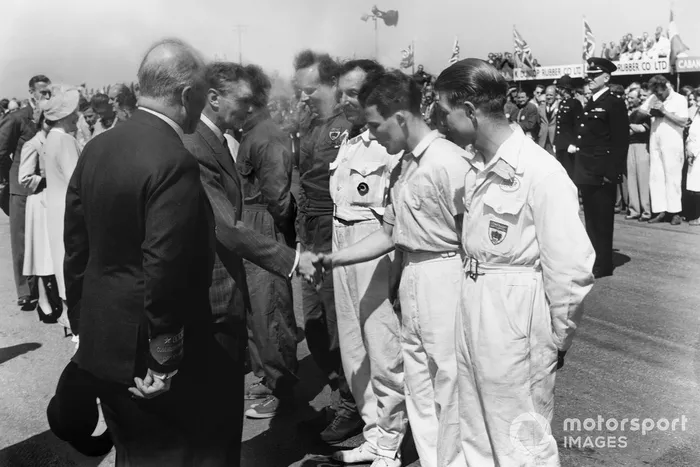 King George VI meets the drivers, including a young Stirling Moss