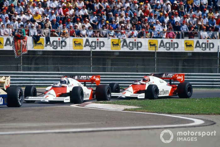 Alain Prost, McLaren MP4-2 TAG, leads Niki Lauda, McLaren MP4-2 TAG