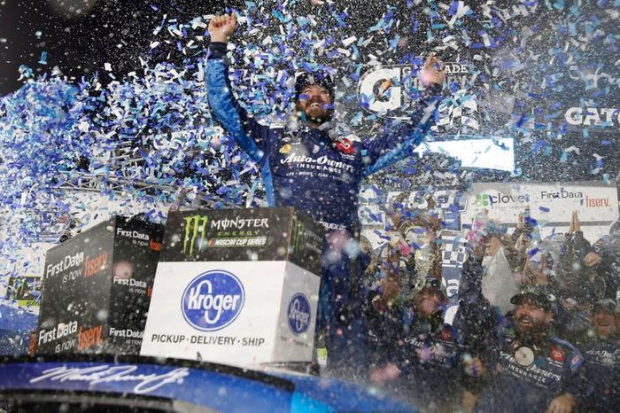 Martin Truex Jr., Joe Gibbs Racing, Toyota Camry Auto Owners Insurance celebrates winning the First Data 500 at Martinsville Speedway.