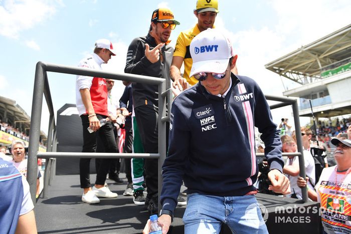 Esteban Ocon, Racing Point Force India F1 Team, Carlos Sainz Jr, Renault Sport F1 Team y Fernando Alonso, McLaren en el desfile de pilotos