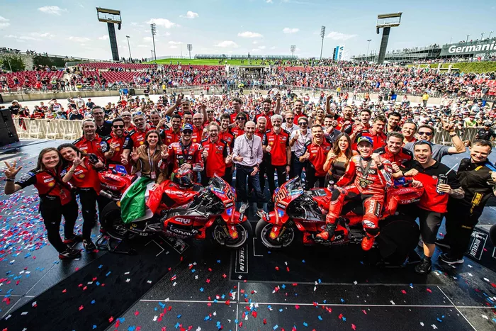 Marc Marquez, Ducati Team celebrate with his team