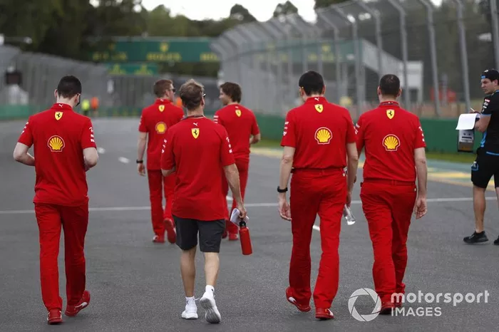 Sebastian Vettel, Ferrari walks the track with members of the team