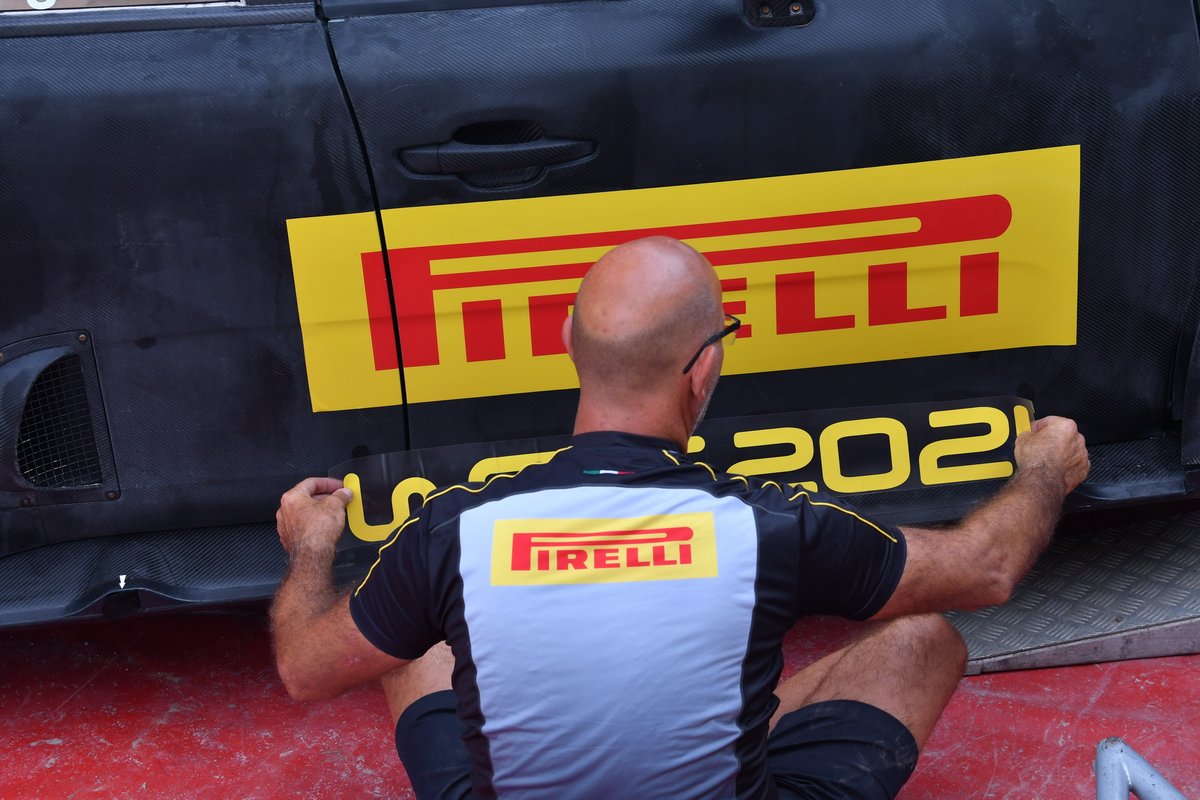 Mechanic is working on the car of Andreas Mikkelsen, Anders Jäger, Citroen C3 WRC