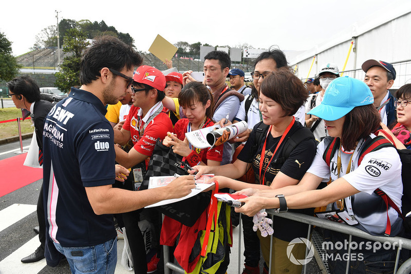 Sergio Perez, Racing Point Force India F1 Team signs autographs for the fans