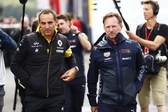 Cyril Abiteboul, Managing Director, Renault Sport F1 Team and Christian Horner, Team Principal, Red Bull Racing, in the paddock