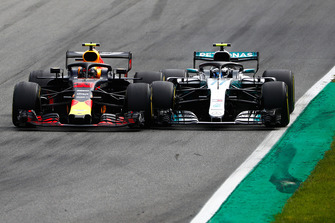 Max Verstappen, Red Bull Racing RB14 Tag Heuer, battles hard with Valtteri Bottas, Mercedes AMG F1 W09