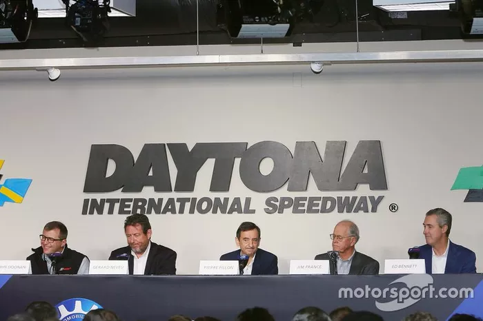 Pierre Fillon, ACO President, Jim France, IMSA Chairman, Gerard Neveu, FIA WEC CEO, John Doonan, IMSA President, and Ed Bennett, IMSA CEO