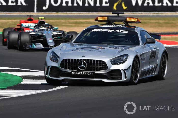Safety car leads the field