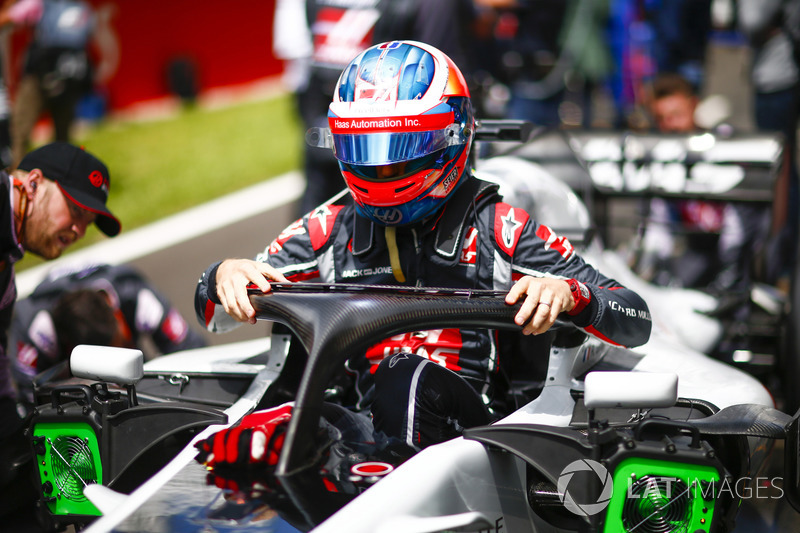 Romain Grosjean, Haas F1 Team, exits his cockpit on the grid