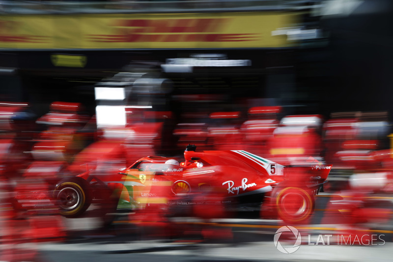 Sebastian Vettel, Ferrari SF71H, makes a pit stop