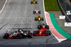 Romain Grosjean, Haas F1 Team VF-18, Sebastian Vettel, Ferrari SF71H, Kevin Magnussen, Haas F1 Team VF-18, Nico Hulkenberg, Renault Sport F1 Team R.S. 18