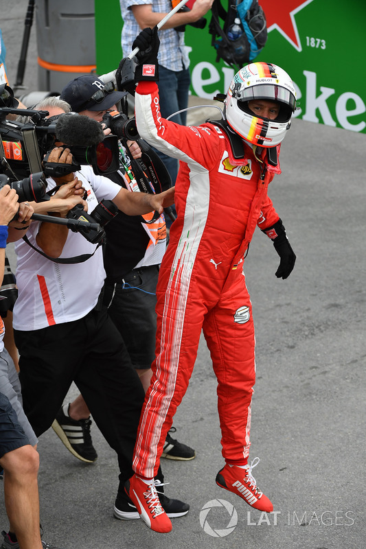 Race winner Sebastian Vettel, Ferrari celebrates in parc ferme