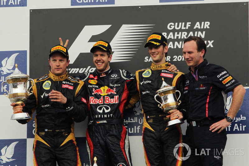 Podium: second place Kimi Raikkonen, Lotus F1 Team, Race winner Sebastian Vettel, Red Bull Racing, R