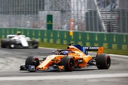 Fernando Alonso, McLaren MCL33, leads Charles Leclerc, Sauber C37